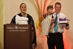 Neill Ceillhe Danica Sperath Accepting a GLOBAL Tourism award in the United States