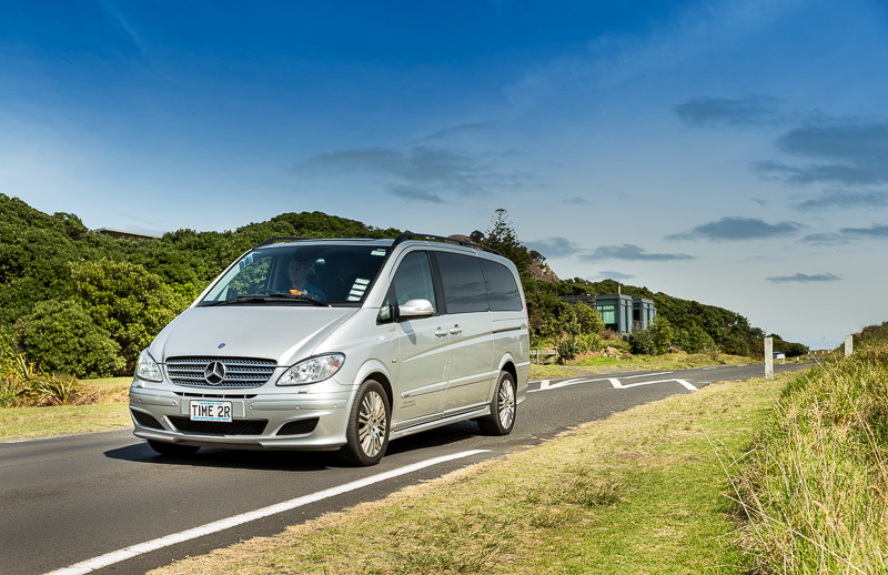 Luxury Mercedes Viano and 4 WD Toyota Highlander overlooking Auckland City & Harbour